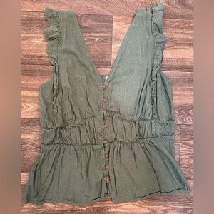 Green sleeveless button peplum top